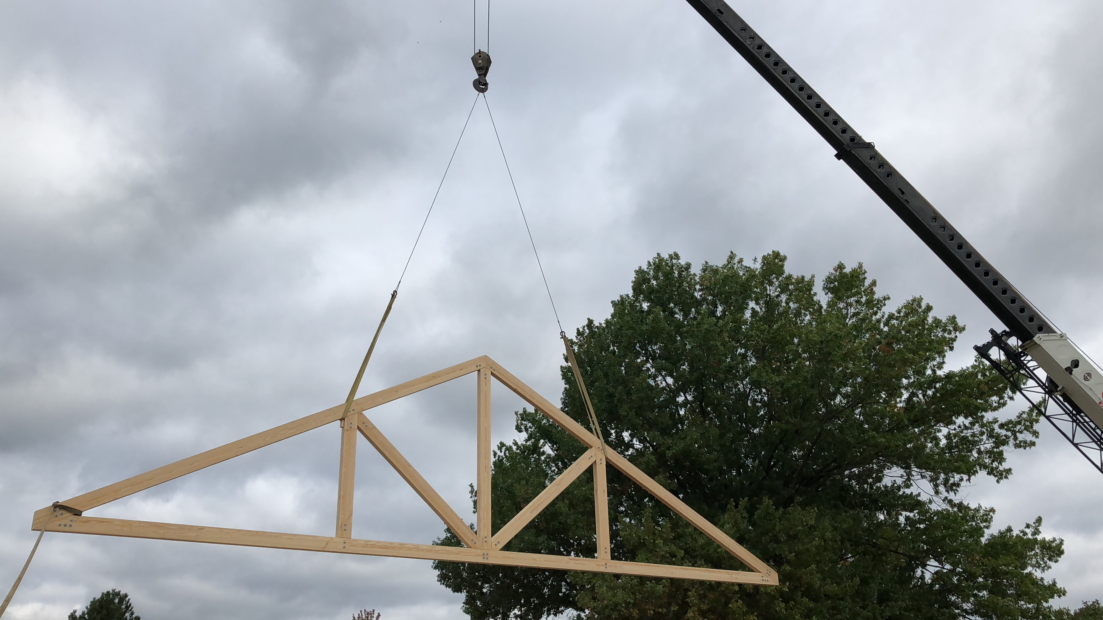 Queen post truss installation.